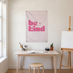 Be Kind in Pink Wall Flag in the art corner room mockup.