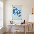 Blue Wave Lettering Wall Flag in the art corner room mockup.