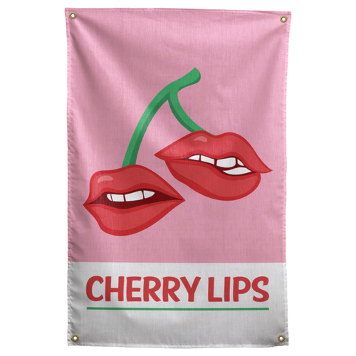 Two red lips hang like cherries from green stems above Cherry Lips lettering on this pink Wall Rebel fabric wall flag.