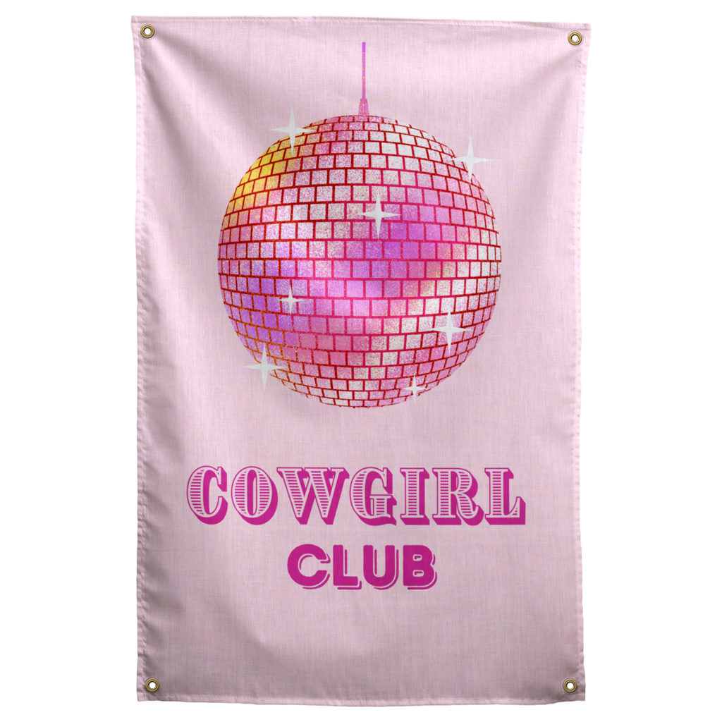 A pink mirrored disco ball hangs over COWGIRL CLUB lettering against a pale pink background on a Wall Rebel fabric wall flag.