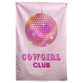 A pink mirrored disco ball hangs over COWGIRL CLUB lettering against a pale pink background on a Wall Rebel fabric wall flag.