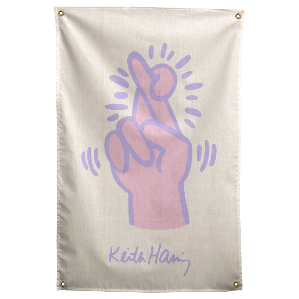 A pale pink hand outlined in purple crosses two fingers with radiating marks on this cream Wall Rebel fabric wall flag.