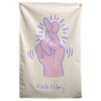 A pale pink hand outlined in purple crosses two fingers with radiating marks on this cream Wall Rebel fabric wall flag.