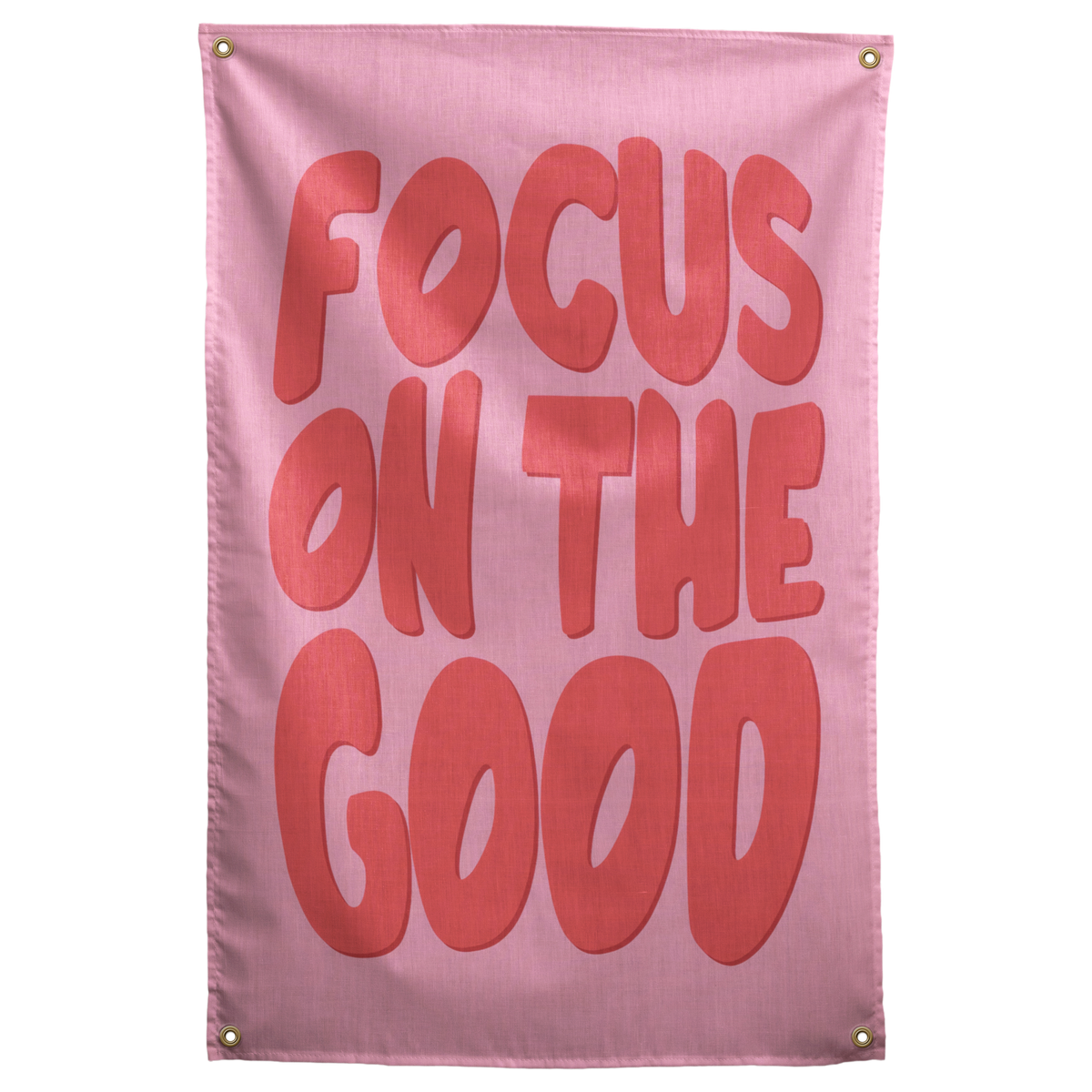 Large rounded coral Focus on the Good lettering fills a pink background on this upbeat Wall Rebel fabric wall flag.