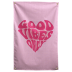 Rounded dark pink Good Vibes Only lettering forms a heart on pale pink in this playful Wall Rebel fabric wall flag.