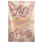 A pastel boombox marked 80's sits between Let's Party lettering on a pink and peach sunburst Wall Rebel fabric wall flag.
