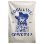 A blue cowgirl portrait with a hat and jewellery sits beneath Long Live Cowgirls words on this Wall Rebel fabric wall flag.