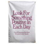 Muted pink Look For Something Positive In Each Day lettering stacks on white in this encouraging Wall Rebel fabric wall flag.