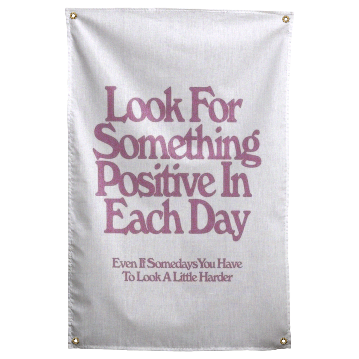 Muted pink Look For Something Positive In Each Day lettering stacks on white in this encouraging Wall Rebel fabric wall flag.
