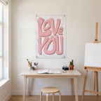 Love You in Pink Wall Flag in the art corner room mockup.