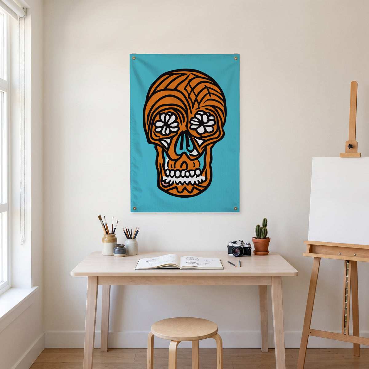 Orange Floral-Eyed Skull Wall Flag in the art corner room mockup.