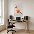 Orange Trumpet Silhouette Wall Flag in the studio room mockup.