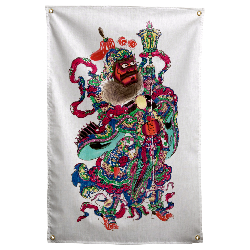 A fierce guardian holds a tall staff, wearing richly patterned robes and elaborate multicolour ornaments on a Wall Rebel fabric wall flag.