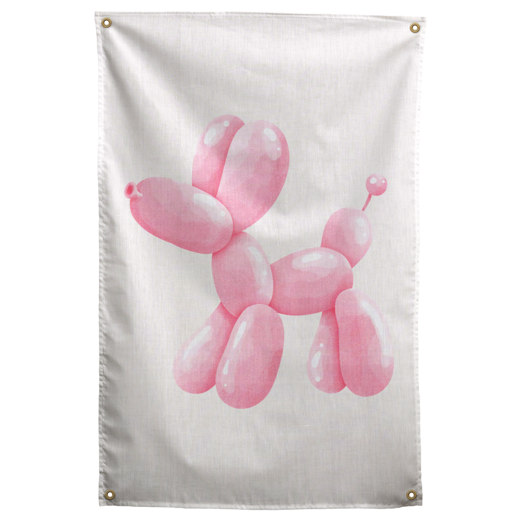 A glossy pink balloon dog stands alone on pale cream, with soft highlights on its rounded shape on a Wall Rebel fabric wall flag.