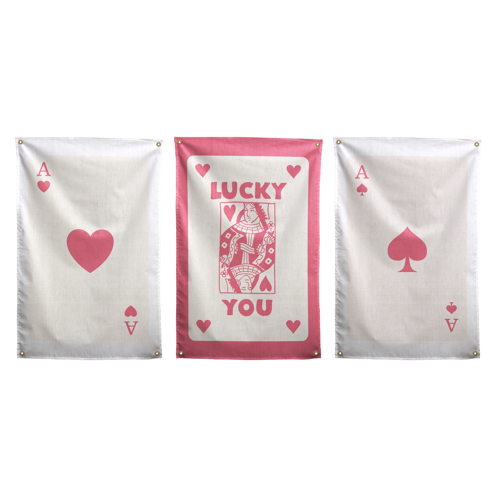 Pink set of three Wall Rebel wall flags: Ace of Hearts, Lucky You in the centre, and Ace of Spades.