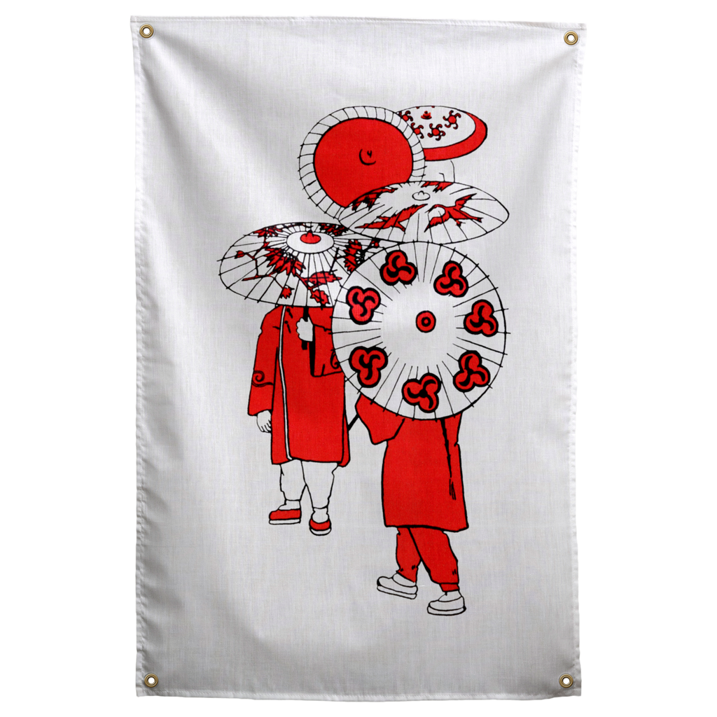 Red-coated figures stand under patterned red-and-white paper parasols against a pale background on a Wall Rebel fabric wall flag.
