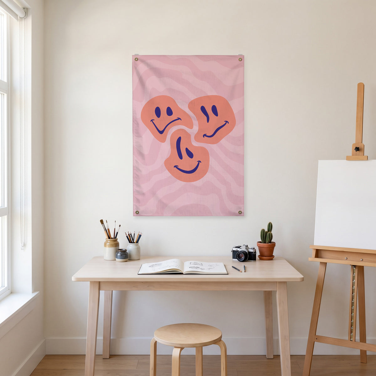 Three Smiley Moods Wall Flag in the art corner room mockup.
