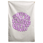Rounded purple You're Doing Great lettering forms a compact circular shape on cream in this encouraging Wall Rebel fabric wall flag.