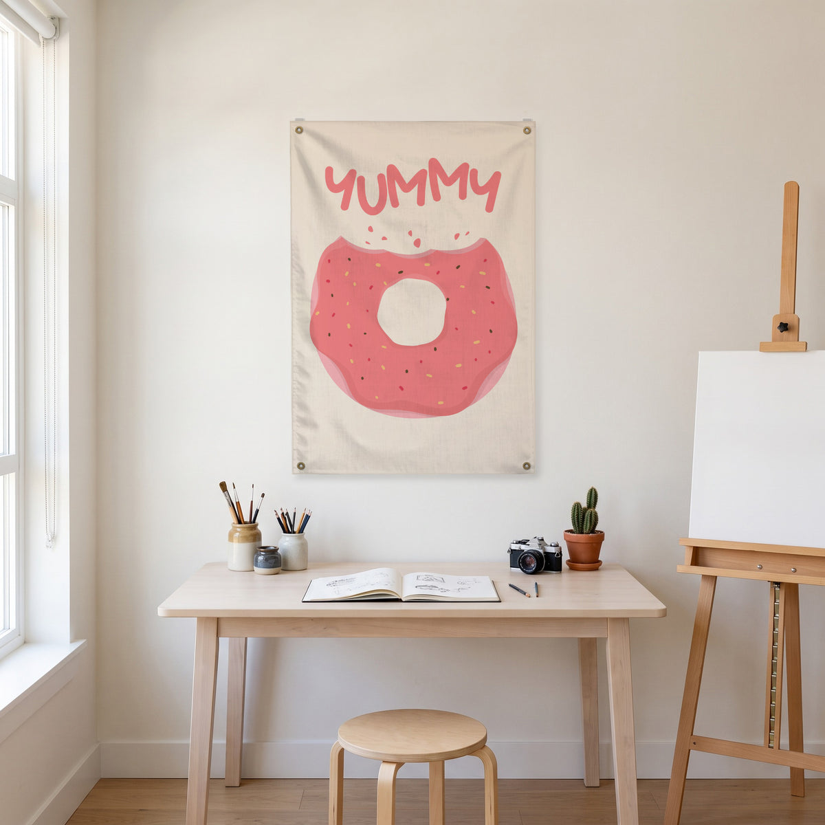 Yummy Pink Doughnut Wall Flag in the art corner room mockup.