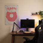 Yummy Pink Doughnut Wall Flag in the streaming nook room mockup.